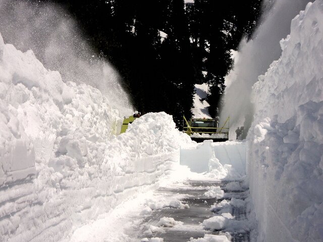 Break through: A snow blower from east of Chinook Pass meets a snowblower from the westside. (June 17 photo: WSDOT)