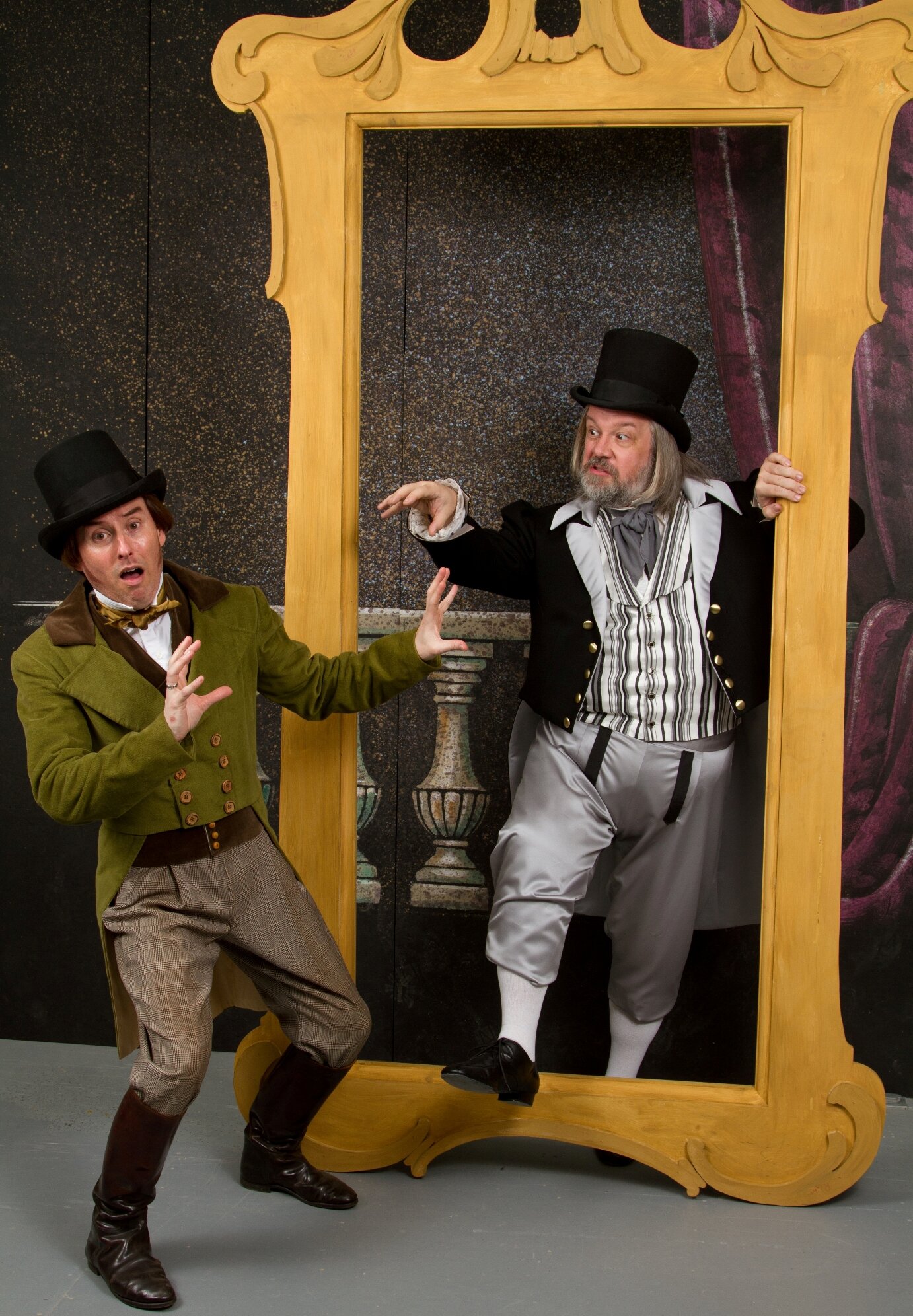 Robin Oakapple (John Brookes) is terrified as the portrait of his uncle, Sir Roderic (William Darkow) comes to life to scold him in the Seattle Gilbert & Sullivan Society’s comic opera Ruddigore. (Photo: Patrick André)