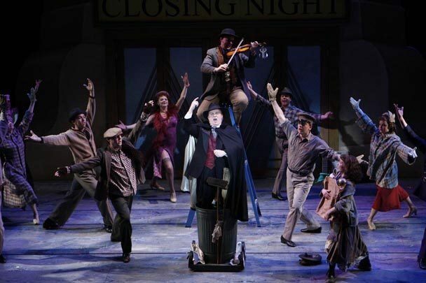 Max Bialystock (Richard Gray, center) and company in Village Theatre's production of The Producers. Photo: Jay Koh