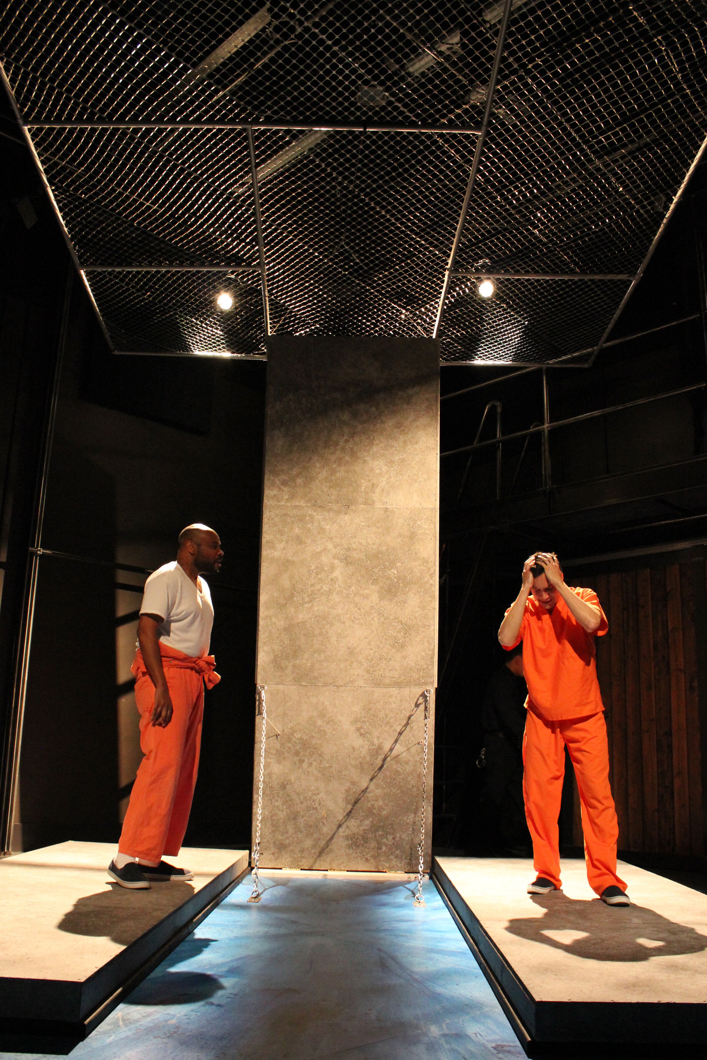 Dumi (left) and Richard Nguyen Sloniker play inmates in the Azeotrope production of Jesus Hopped the A Train