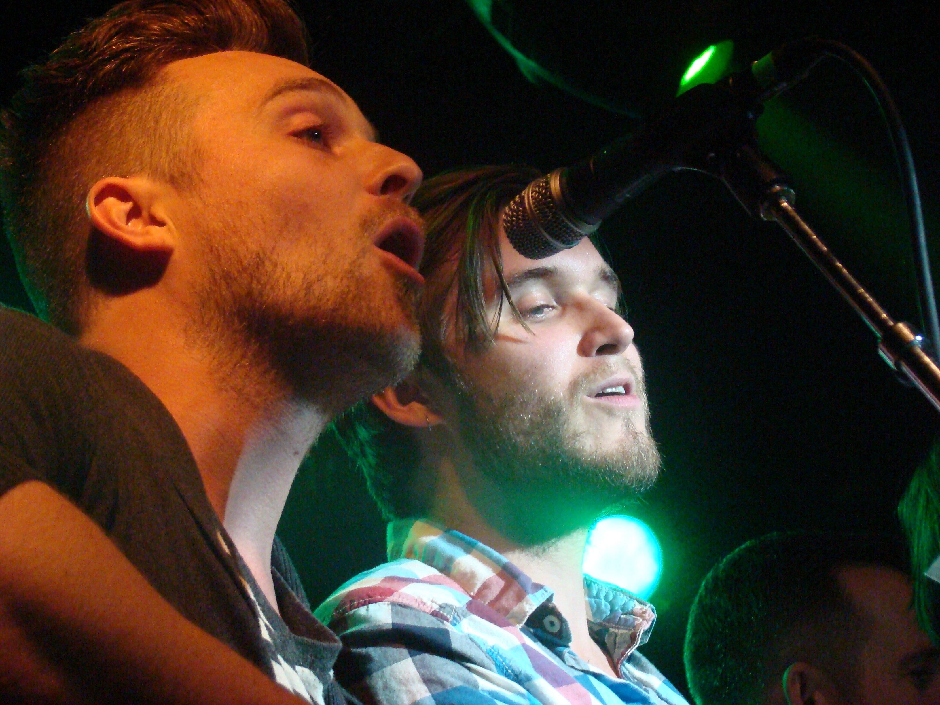 Tim and Pete Wilson of Ivan and Alyosha belt out "Auld Lang Syne." (photo by Tony Kay)