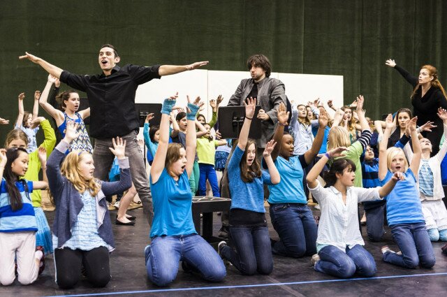 Our Earth rehearsal: tenor John Coons, baritone Thomas Thompson, soprano Sonia Perez, and the Youth Chorus (Photo: Robert Wade)